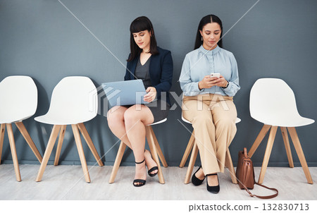 Waiting room, interview and women ready for hiring meeting with laptop and phone in office building. People, employee and worker preparing for business internship or job opportunity or employment Waiting room, interview and women ready for hiring meeting with laptop and phone in office building. People, employee and worker preparing for business internship or job opportunity or employment 132830713