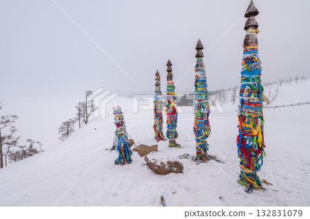Rows of the Shaman poles at cape Burkhan on Olkhon island in Lake Baikal, Russia. The poles represent the 13 deities of the island. Rows of the Shaman poles at cape Burkhan on Olkhon island in Lake Baikal, Russia. The poles represent the 13 deities of the island. 132831079