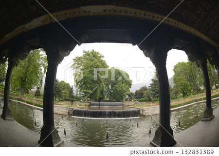 The interior of the Shalimar Bagh Gardens, a beautiful Mughal garden in Srinagar, Jammu and Kashmir, India, is decorated with fountains, ponds and a variety of plants. The interior of the Shalimar Bagh Gardens, a beautiful Mughal garden in Srinagar, Jammu and Kashmir, India, is decorated with fountains, ponds and a variety of plants. 132831389
