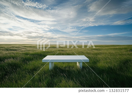 Stunning Open Prairie Landscape With White Table Under Dramatic Sky and Lush Green Grass 132831577