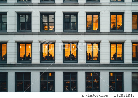 Urban Building Facade with Numerous Windows and People Engaged Inside Various Activities Urban Building Facade with Numerous Windows and People Engaged Inside Various Activities 132831813
