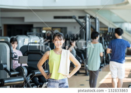 A young woman training at the gym. Photo courtesy of Sports Club & Sauna Spa Renaissance Makuhari 24 A young woman training at the gym. Photo courtesy of Sports Club & Sauna Spa Renaissance Makuhari 24 132833863