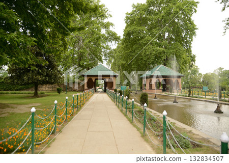 Shalimar Bagh is a beautiful Mughal garden in Srinagar, Jammu and Kashmir, India. It is a garden with fountains, ponds and various plants. Shalimar Bagh is a beautiful Mughal garden in Srinagar, Jammu and Kashmir, India. It is a garden with fountains, ponds and various plants. 132834507