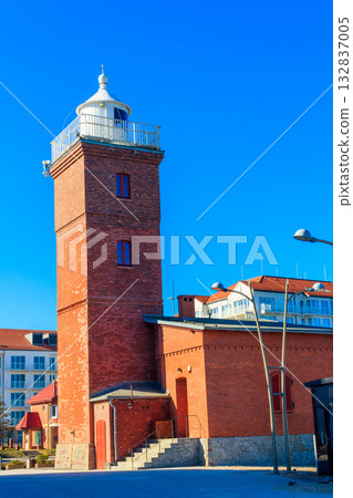 Old brick lighthouse at the Wieprza river mouth to the Baltic Sea in Darlowko, Poland Old brick lighthouse at the Wieprza river mouth to the Baltic Sea in Darlowko, Poland 132837005