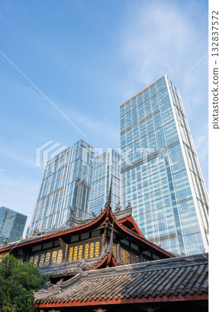 Historic architecture contrasts with modern skyscrapers in Chengdu 132837572