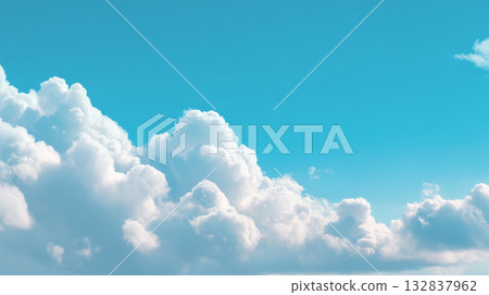 [Blue sky and white clouds] A background of clouds floating in a vibrant blue sky 132837962