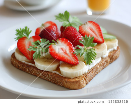 Toast topped with fresh strawberries - a stylish and healthy breakfast Toast topped with fresh strawberries - a stylish and healthy breakfast 132838316