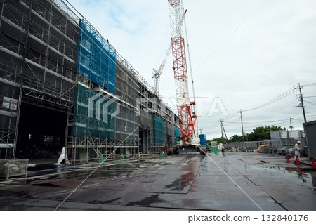 A construction site where light rain is falling 132840176