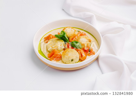 Cheesecakes with salmon and cream sauce, modern breakfast, cottage cheese pancakes Cheesecakes with salmon and cream sauce, modern breakfast, cottage cheese pancakes 132841980