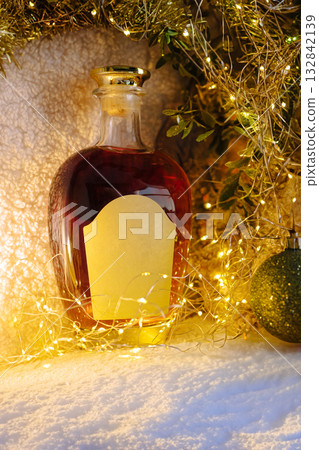 Warm holiday drink displayed with lights and decorations in cozy setting Warm holiday drink displayed with lights and decorations in cozy setting 132842139
