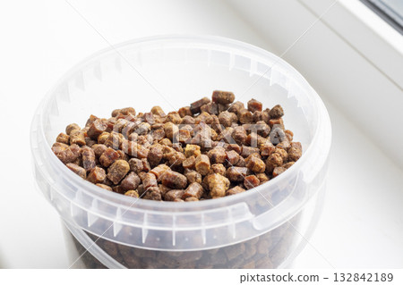 Close shot of the bee bread in the plastic container Close shot of the bee bread in the plastic container 132842189
