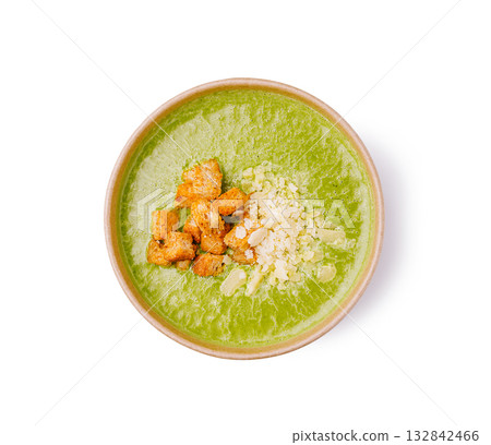 Creamy green soup with crispy croutons and herbs served in a bowl Creamy green soup with crispy croutons and herbs served in a bowl 132842466
