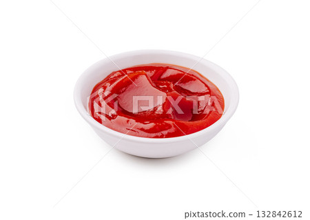 Bowl of bright red ketchup on a plain white background 132842612