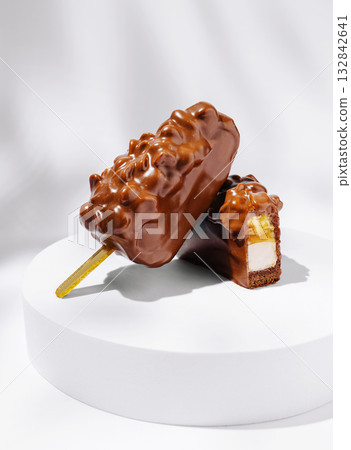 Delicious chocolate ice cream bars with creamy filling on a white plate Delicious chocolate ice cream bars with creamy filling on a white plate 132842641