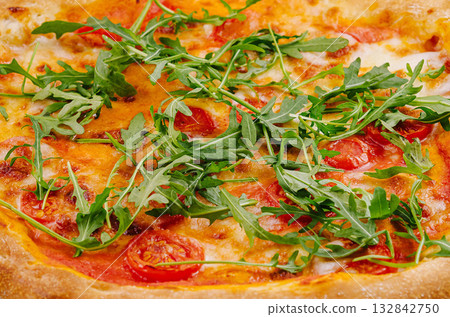 Fresh italian pizza with arugula and tomato 132842750