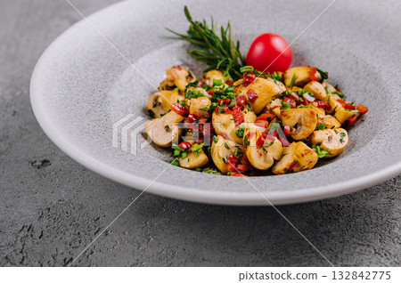 Sauteed mushrooms with herbs in a plate Sauteed mushrooms with herbs in a plate 132842775