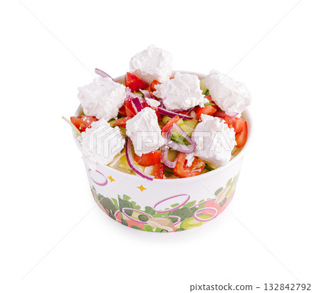 Fresh salad bowl with vegetables and creamy topping served in a colorful dish 132842792