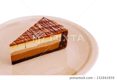 Delicious layered chocolate dessert on a plate ready to be enjoyed Delicious layered chocolate dessert on a plate ready to be enjoyed 132842859