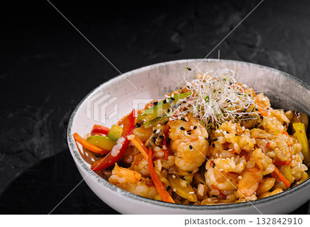Gourmet shrimp fried rice in elegant bowl Gourmet shrimp fried rice in elegant bowl 132842910