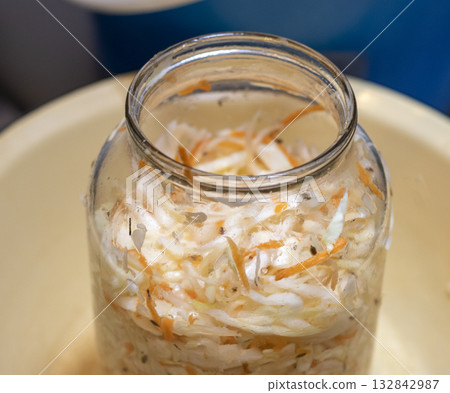 Glass jar with home made sauerkraut 132842987