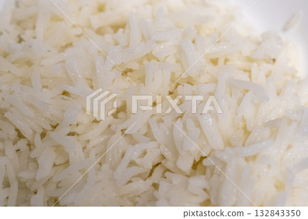 Close up shot of the cooked white rice in the bowl 132843350
