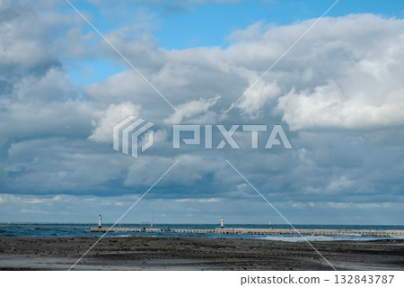 seaside tranquil view, peaceful maritime setting with lush algaecovered stones and reflective wet seaside tranquil view, peaceful maritime setting with lush algaecovered stones and reflective wet 132843787