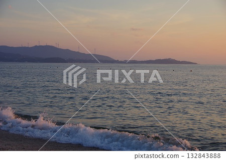Minamiawaji City, Hyogo Prefecture: View of Cape Ganko from Keino Matsubara Beach at sunset Minamiawaji City, Hyogo Prefecture: View of Cape Ganko from Keino Matsubara Beach at sunset 132843888