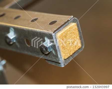 Furniture leg or part of a shelving unit, fitted with a protective felt pad Furniture leg or part of a shelving unit, fitted with a protective felt pad 132843997