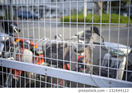 Motorcycle bicycle parking lot fence simple image Motorcycle bicycle parking lot fence simple image 132844122