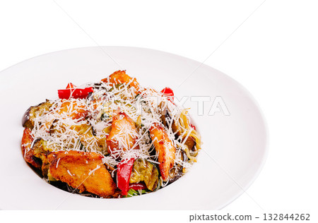 Delicious plate of pasta with vegetables and cheese served in restaurant setting Delicious plate of pasta with vegetables and cheese served in restaurant setting 132844262