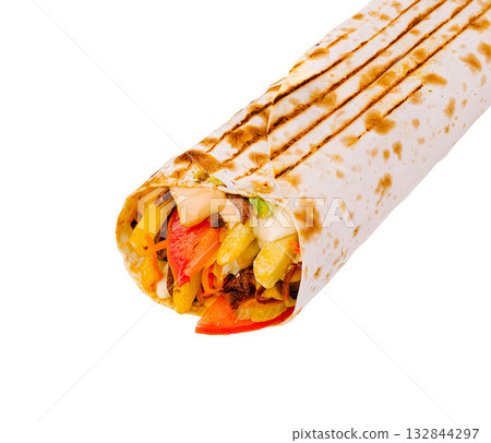 Delicious burrito filled with grilled vegetables and meat ready for a tasty meal 132844297