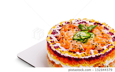 Colorful holiday layered salad featuring salmon and vegetables for a festive occasion 132844379