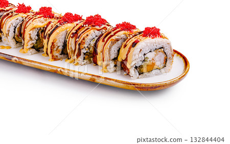 Sushi rolls plated beautifully with vibrant toppings at a restaurant Sushi rolls plated beautifully with vibrant toppings at a restaurant 132844404