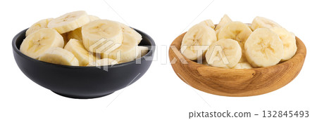 peeled banana pieces in ceramic and wooden bowl isolated on white background 132845493