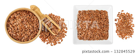 flaxseed in wooden bowl isolated on white background. Top view. Flat lay 132845529