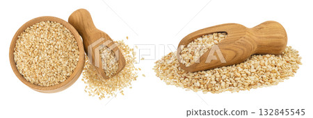 Sesame seeds in wooden bowl and scoop isolated on white background. Top view. Flat lay 132845545