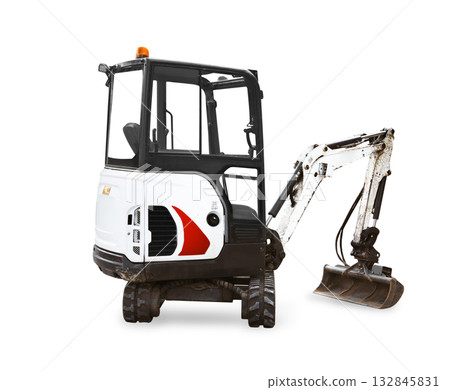 A white and black tracked mini excavator with a cab and an extended arm ending in a small bucket, isolated on a clean white background. A white and black tracked mini excavator with a cab and an extended arm ending in a small bucket, isolated on a clean white background. 132845831