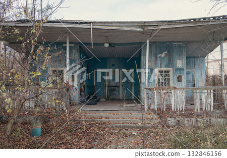 Old abandoned wooden house boat station blue color. Old abandoned wooden house boat station blue color. 132846156