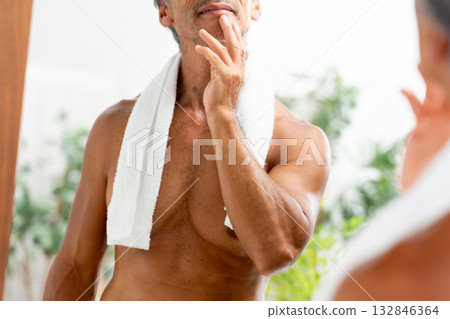 Man looking in the mirror Beauty Man looking in the mirror Beauty 132846364