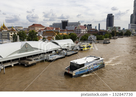 Sathorn Ferry Terminal on the Chao Phraya River in Bangkok, the capital of Thailand. Sathorn Ferry Terminal on the Chao Phraya River in Bangkok, the capital of Thailand. 132847730