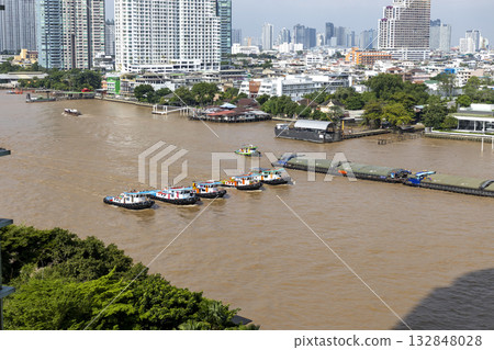 Scenery of the Chao Phraya River and working boats in Bangkok, the capital of Thailand Scenery of the Chao Phraya River and working boats in Bangkok, the capital of Thailand 132848028
