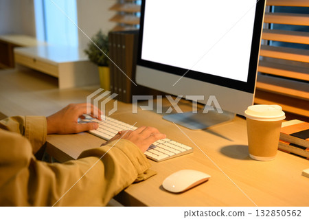 Cropped shot man working with computer Cropped shot man working with computer 132850562