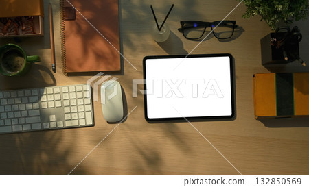 Office desk tablet with computer keyboard, notebook and office supplies 132850569
