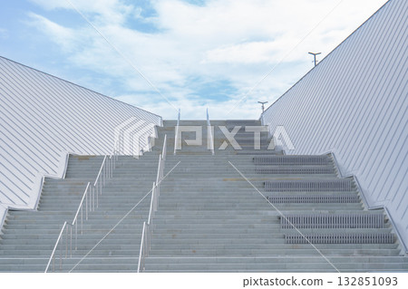 Stairs to the Blue Heaven. Wide staircase leads to roof of Naval Glory Museum, paths and observation platforms at the top. Kronshtadt Stairs to the Blue Heaven. Wide staircase leads to roof of Naval Glory Museum, paths and observation platforms at the top. Kronshtadt 132851093