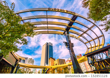New view of Tokyo cityscape in Japan. Ikebukuro West Exit Park in front of Ikebukuro Station, overlooking the Global Ring and skyscrapers. (7th) 132851128