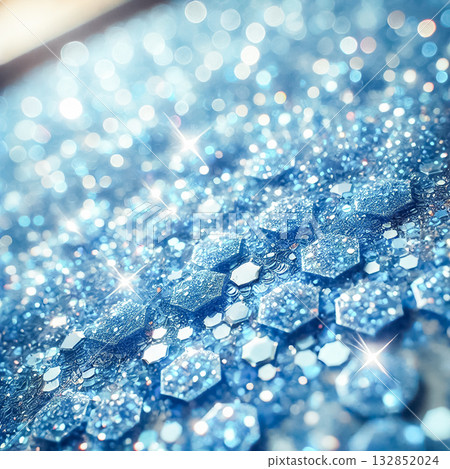 Light blue glitter particles, large and hexagonal, covering a surface from a low angle. The smooth, uniform texture features bright sky blue to light azure tones, with soft light reflections creating Light blue glitter particles, large and hexagonal, covering a surface from a low angle. The smooth, uniform texture features bright sky blue to light azure tones, with soft light reflections creating 132852024