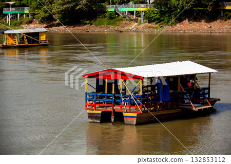 Boats on a river. View of the Sinu River at the Monteria City in Colombia Boats on a river. View of the Sinu River at the Monteria City in Colombia 132853112