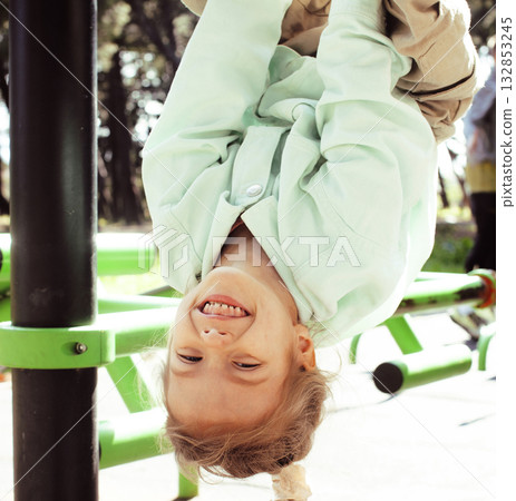 two pretty sisters twins playing outside, lifestyle people concept 132853245