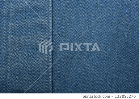 Denim fabric with blue thread seams, denim jacket, denim pants, for background or fabric sample sale. Denim fabric with blue thread seams, denim jacket, denim pants, for background or fabric sample sale. 132853270