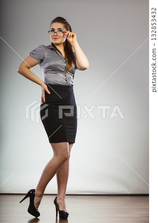 Teacher looking elegant woman Teacher looking elegant woman 132853432